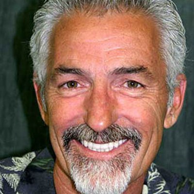 Dental patient sharing flawless new smile