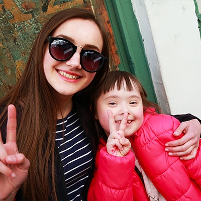 Smiling mother and child after children's dentistry visit