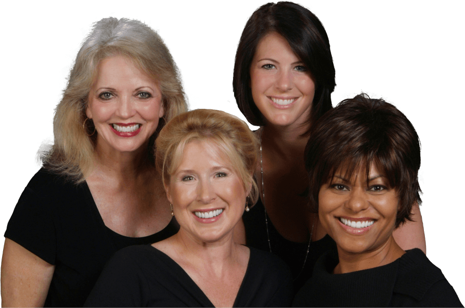 Four women smiling after visiting their dentist in Rancho Bernardo