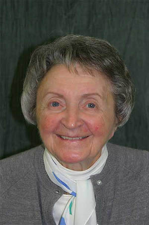 Older woman with unnatural looking dental restorations