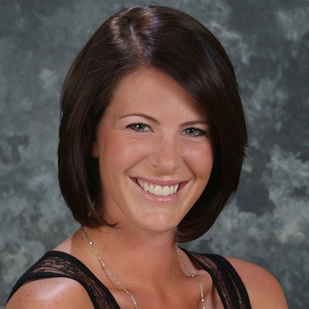Woman smiling after preventive dentistry in Rancho Bernardo
