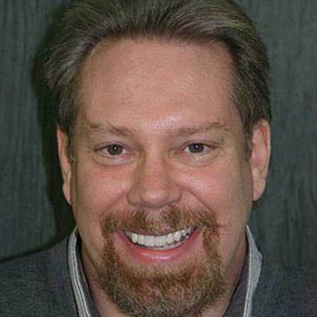 Man smiling after sleep apnea treatment in Rancho Bernardo