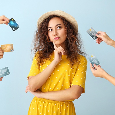 Woman surrounded by credit cards