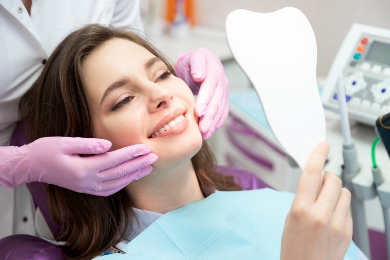 A woman preparing to get cosmetic dentistry